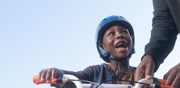 Young boy riding a bike