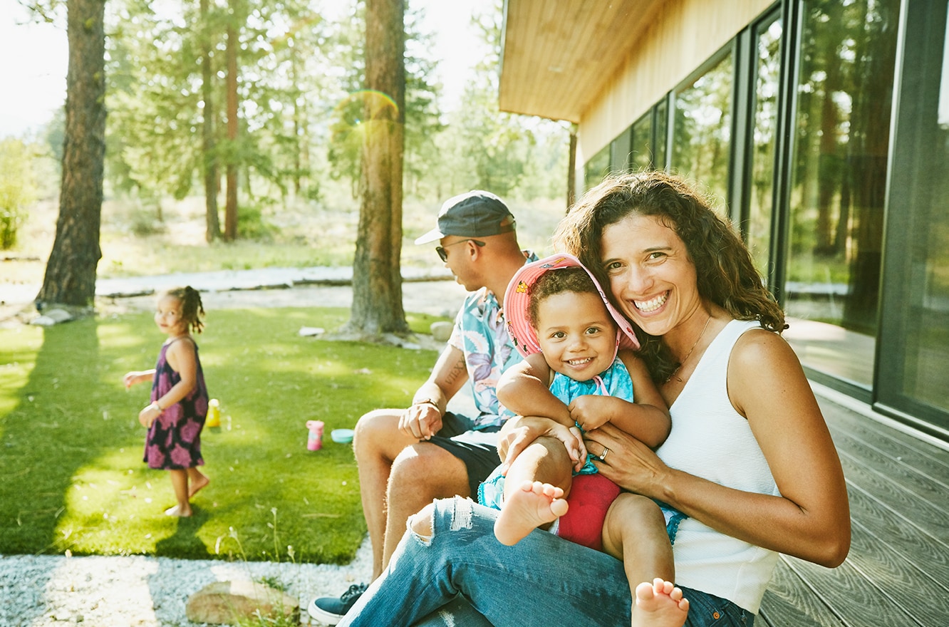 Family sitting in their backyard